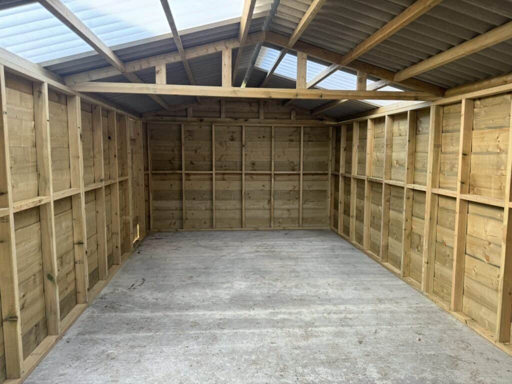 Interior shot of a hay barn constructed by Sussex Stables, April 2024