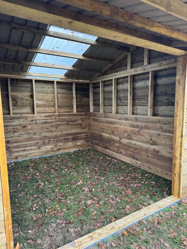 Interior shot of a field shelter built by Sussex Stables, July 2023